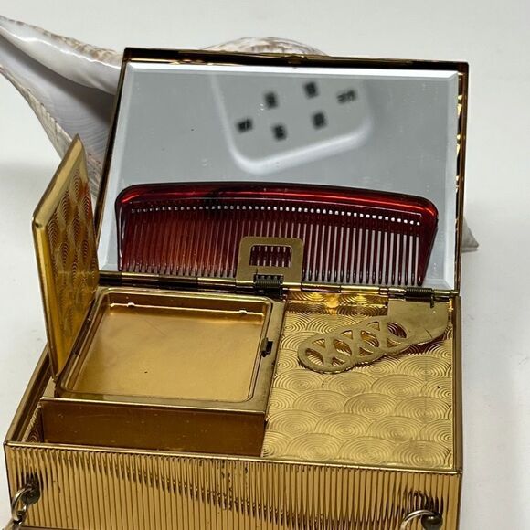 Vintage, gold tone compact/purse.  